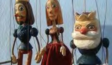 wooden puppets on strings