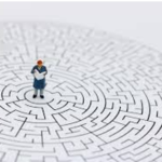 man standing in the middle of a maze