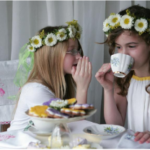girls sipping tea