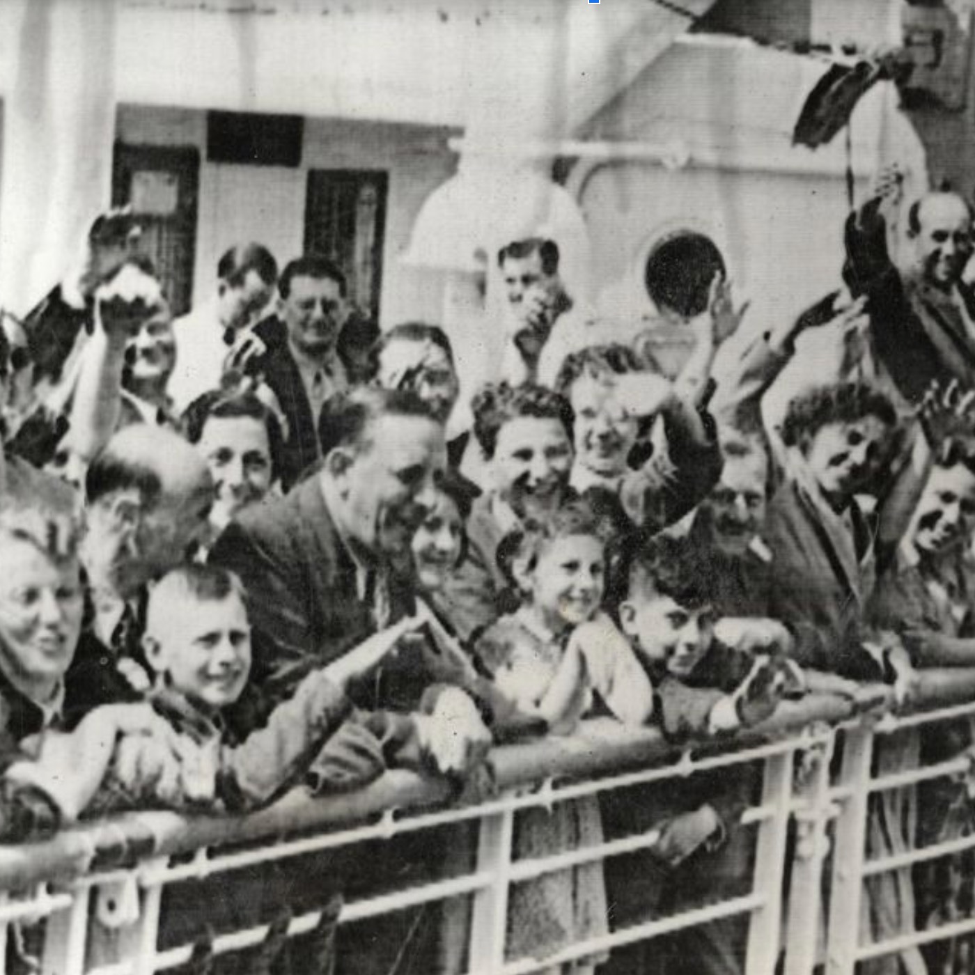 old photo of people waving from large boat
